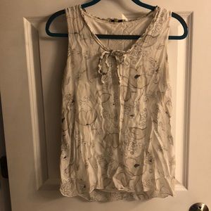 Light and flowey lined tank top. Shell is silk. Great condition.